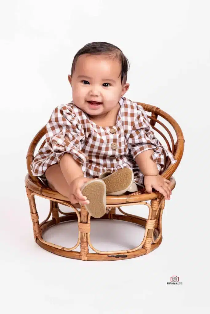 Professional children's photographer specializing in capturing pure joy in Wellington